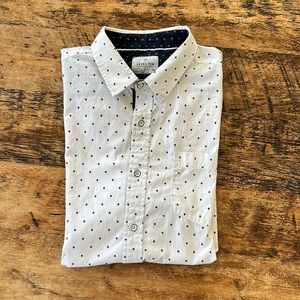 Men’s L Level Ten short sleeve (longer back) button-down shirt with pocket.